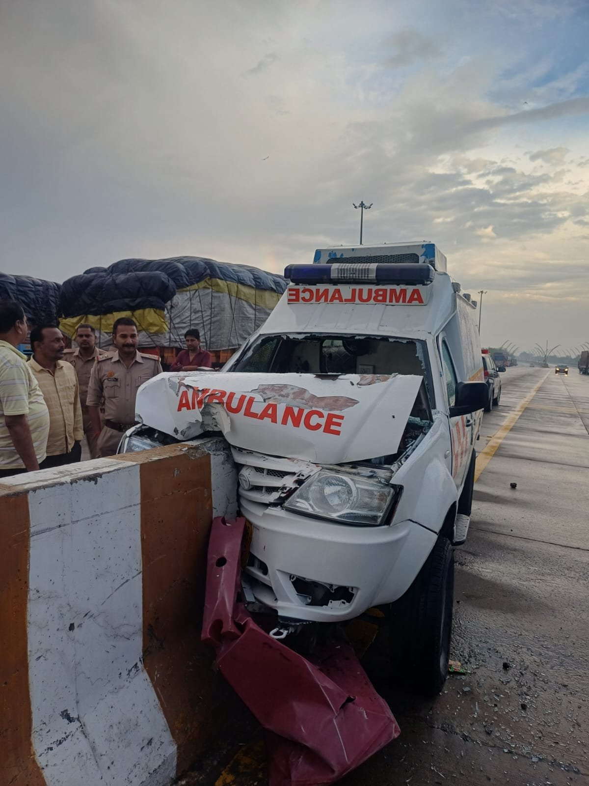 Damaged ambulance after crashing into a culvert on the Agra-Lucknow Expressway near Fatehabad, leaving five people injured.
