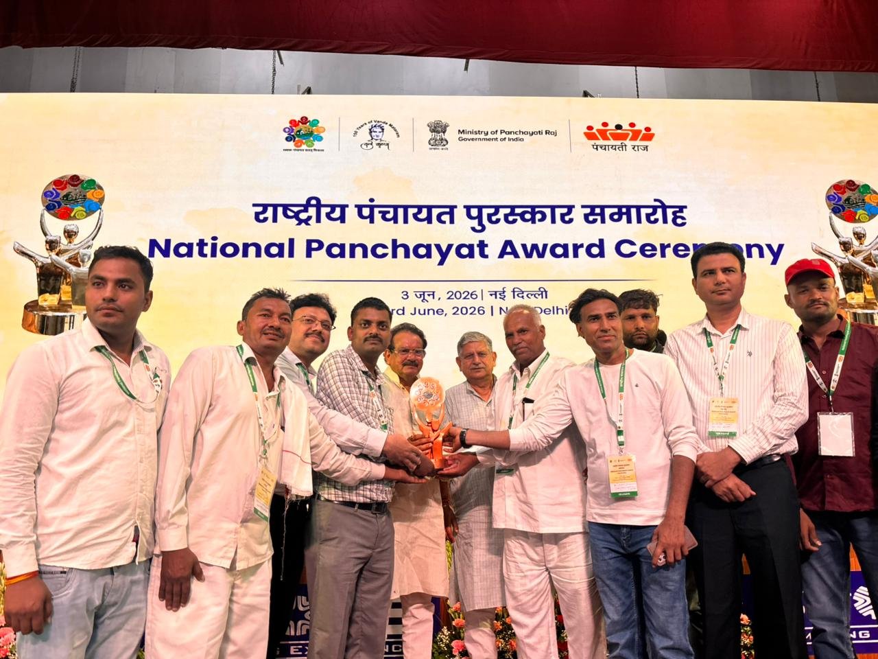 Representatives of Birharu Gram Panchayat, Agra, receiving the Nanaji Deshmukh Best Panchayat Sustainable Development Award at the National Panchayat Awards ceremony in New Delhi.