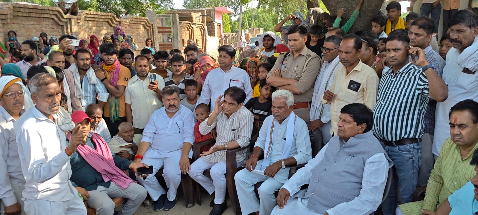 Rajya Sabha MP Ramjilal Suman interacts with villagers during his visit to Pinnapura village in Fatehabad, Agra, following recent police action.