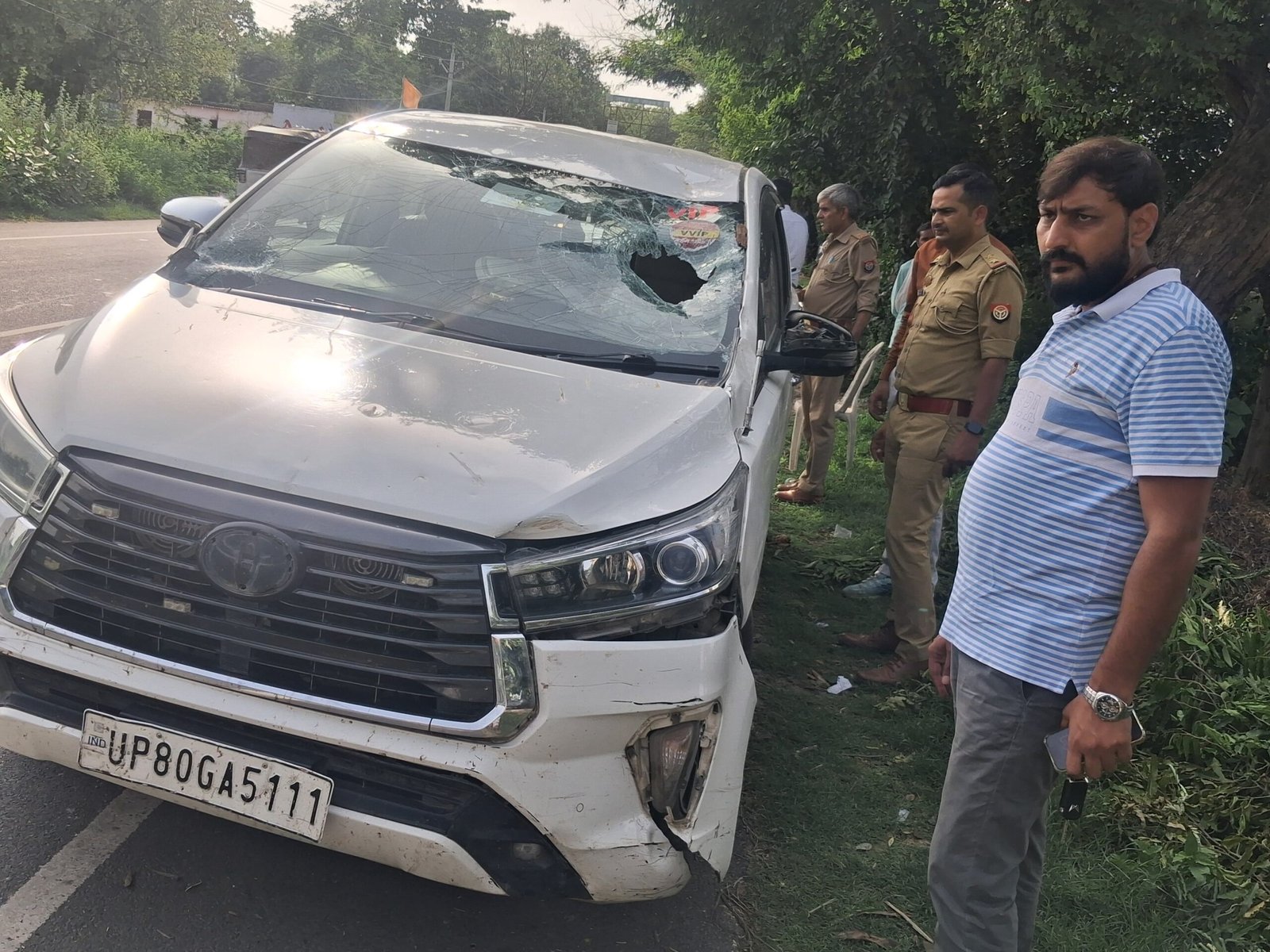 Former Uttar Pradesh Minister Udaybhan Singh's car damaged after a dry tree fell on it near Bamrauli Katara on the Agra–Fatehabad road.