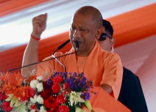 Chief Minister Yogi Adityanath addressing a public gathering at Tata Ground, Agra, after inaugurating and laying foundation stones for development projects worth ₹342.36 crore.