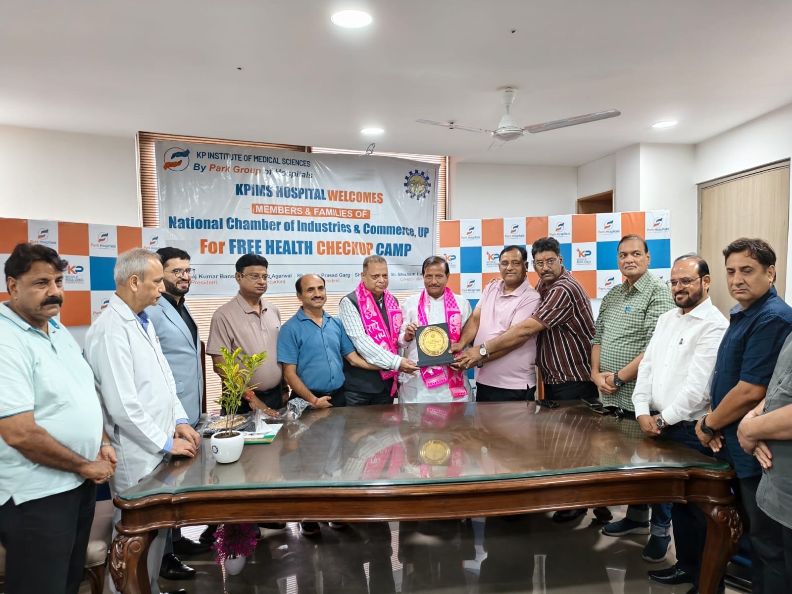 Guests being honored during the National Chamber and KP Medical Institute free health checkup camp in Agra